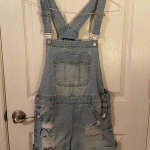 Blue washed ripped overall shorts